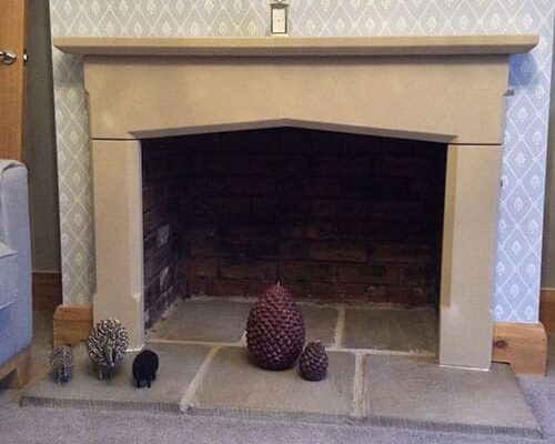 traditional minster stone fireplace surround